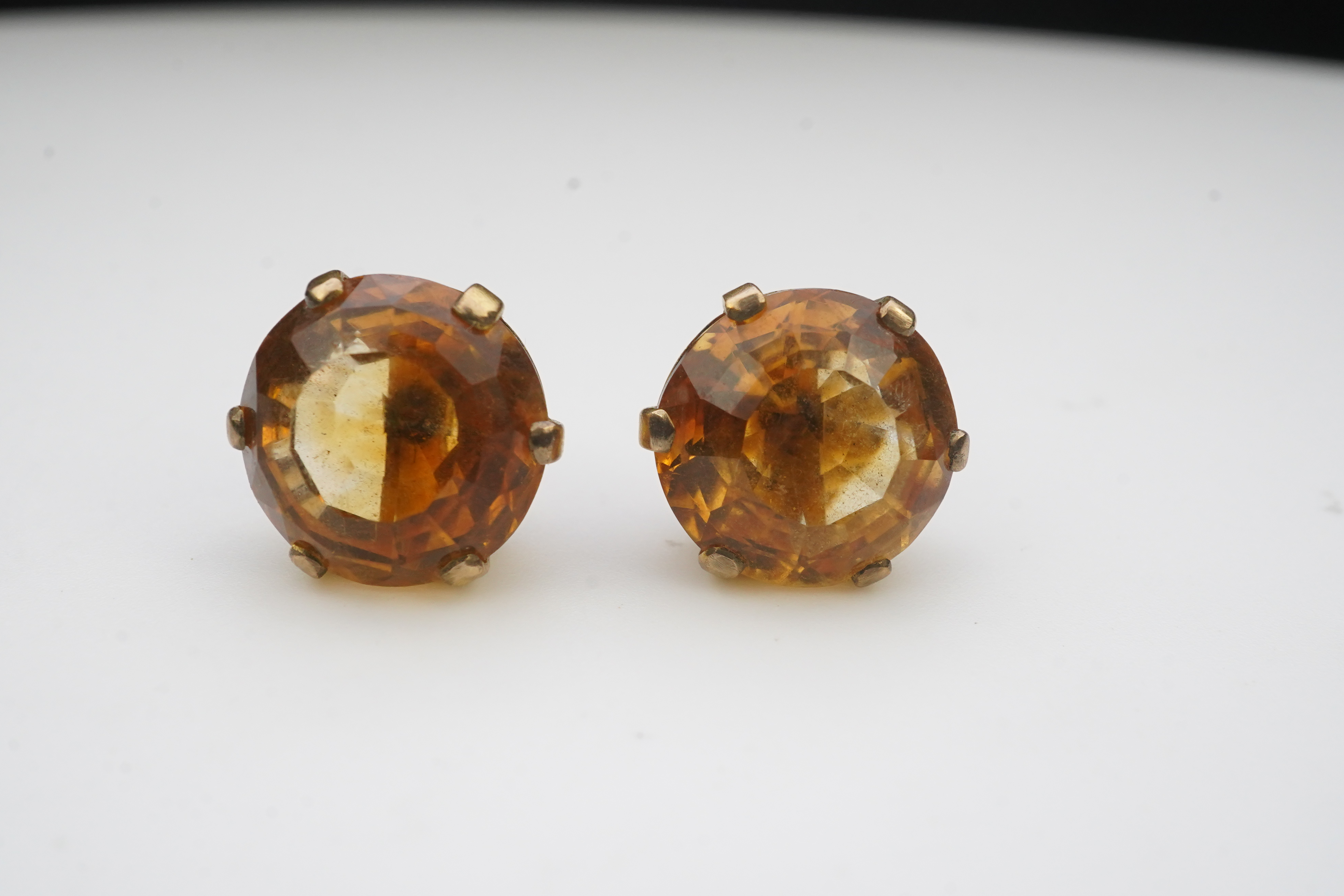 A pair of citrine ear studs